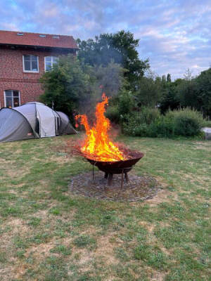 Meadow with fireplace next to our historic barn (Campspace 7212)