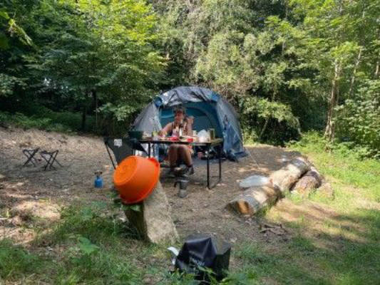 Off grid nature campsite in private forest garden 