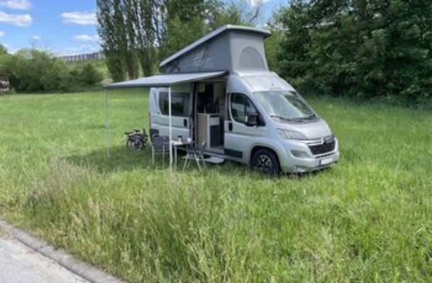 Camping in the green idyll by the stream