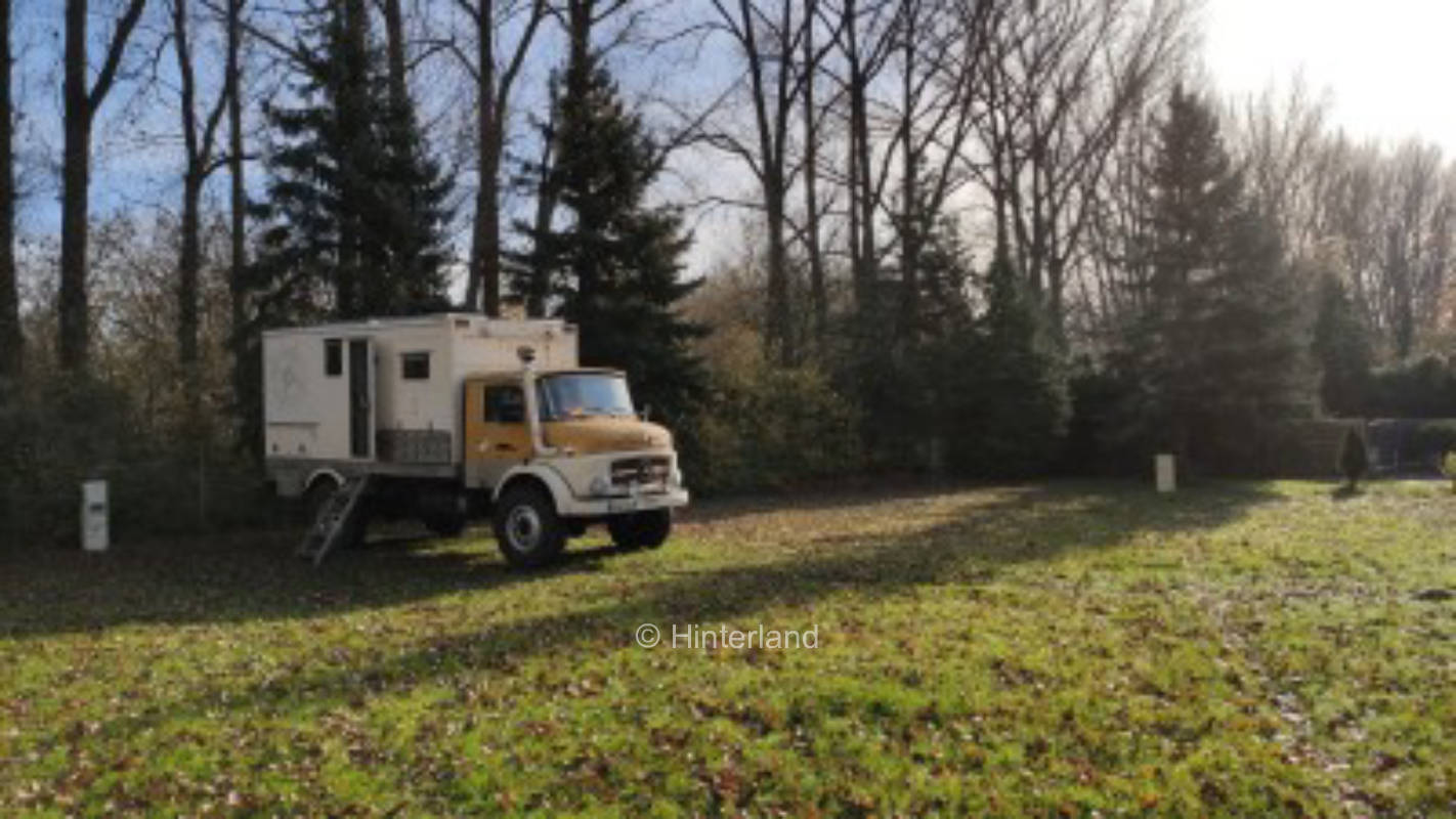 Green gravel / lawn parking lot at pony farm