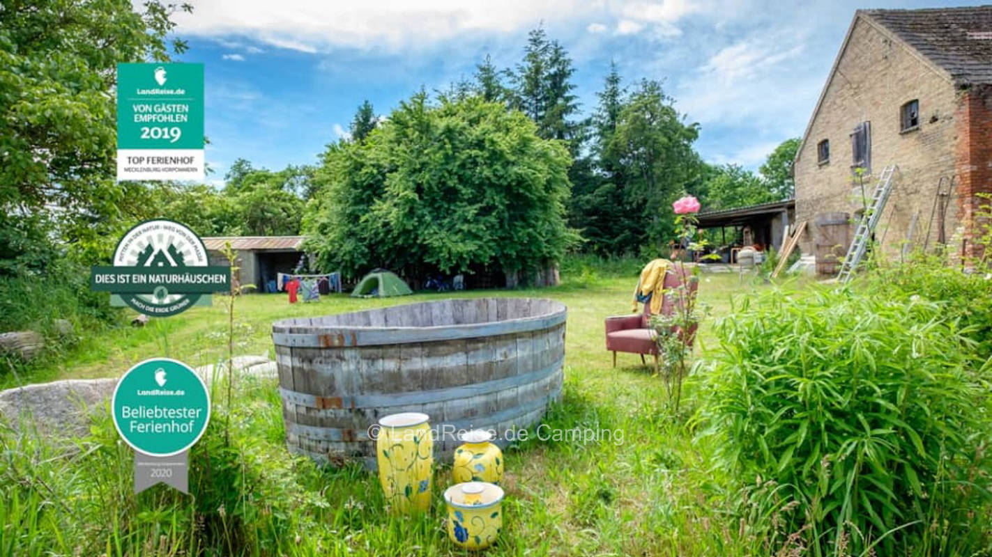 With tent and camper on an artist farm near the Baltic Sea