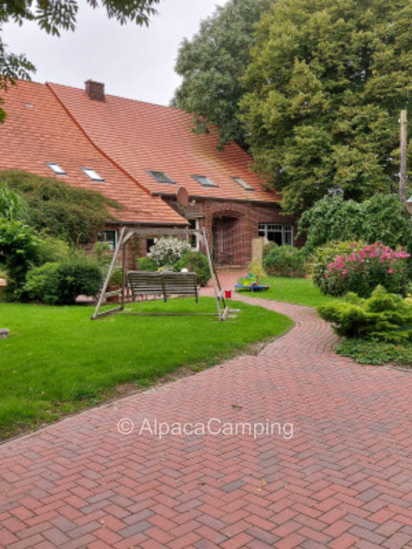 In the cottage garden with old trees
