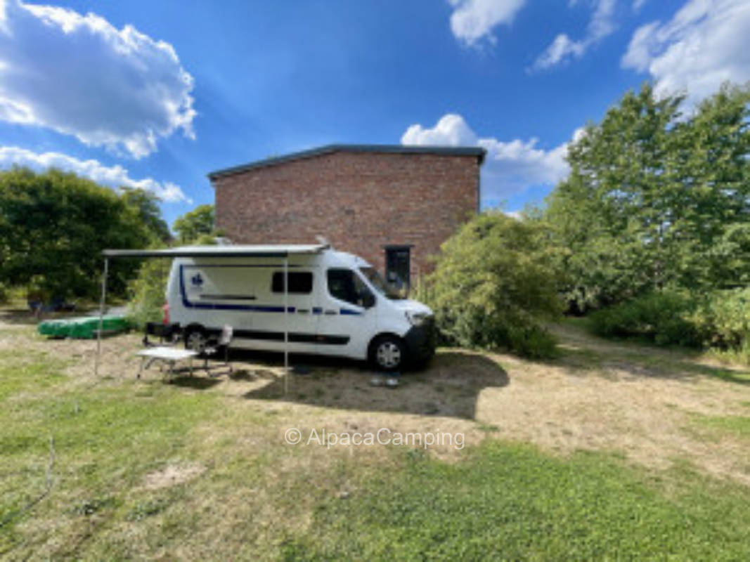 Single parking space in dreamlike location on property with sheep and brook