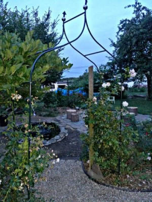 Idyllic meadow orchard with romantic garden