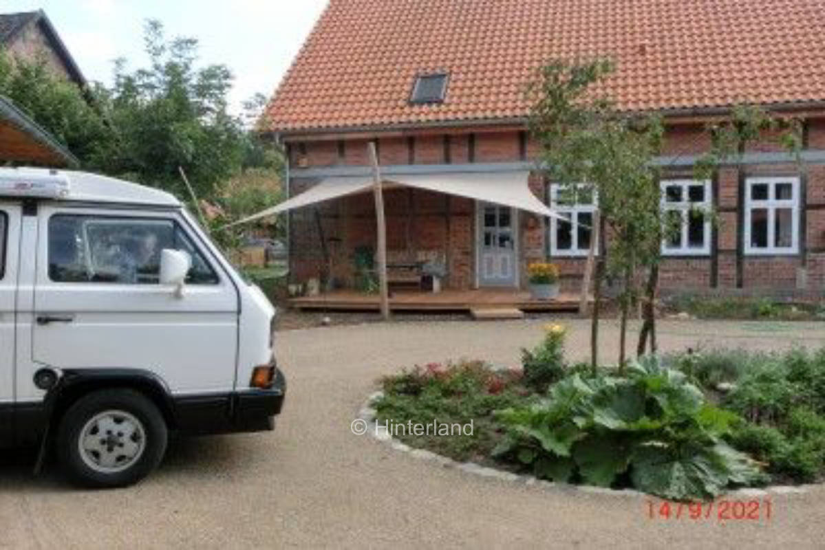 Camping behind half-timbered house, northern Wendland