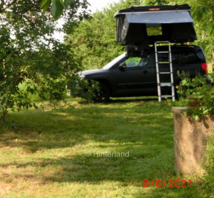 Camping behind half-timbered house, northern Wendland