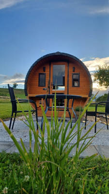 Sleeping barrel family barrel overnight stay in nature
