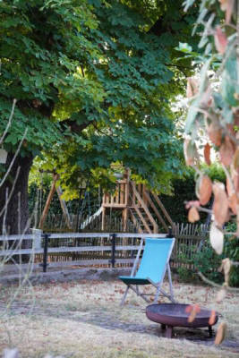 Minicamp on former farm with sanitary facilities & electricity, close to public swimming pool (Campspace 28598)