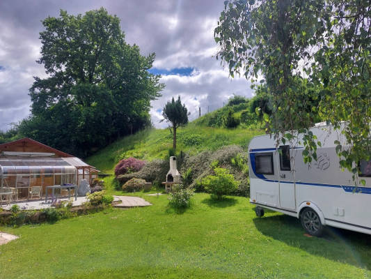 Idyllic secure garden by the stream