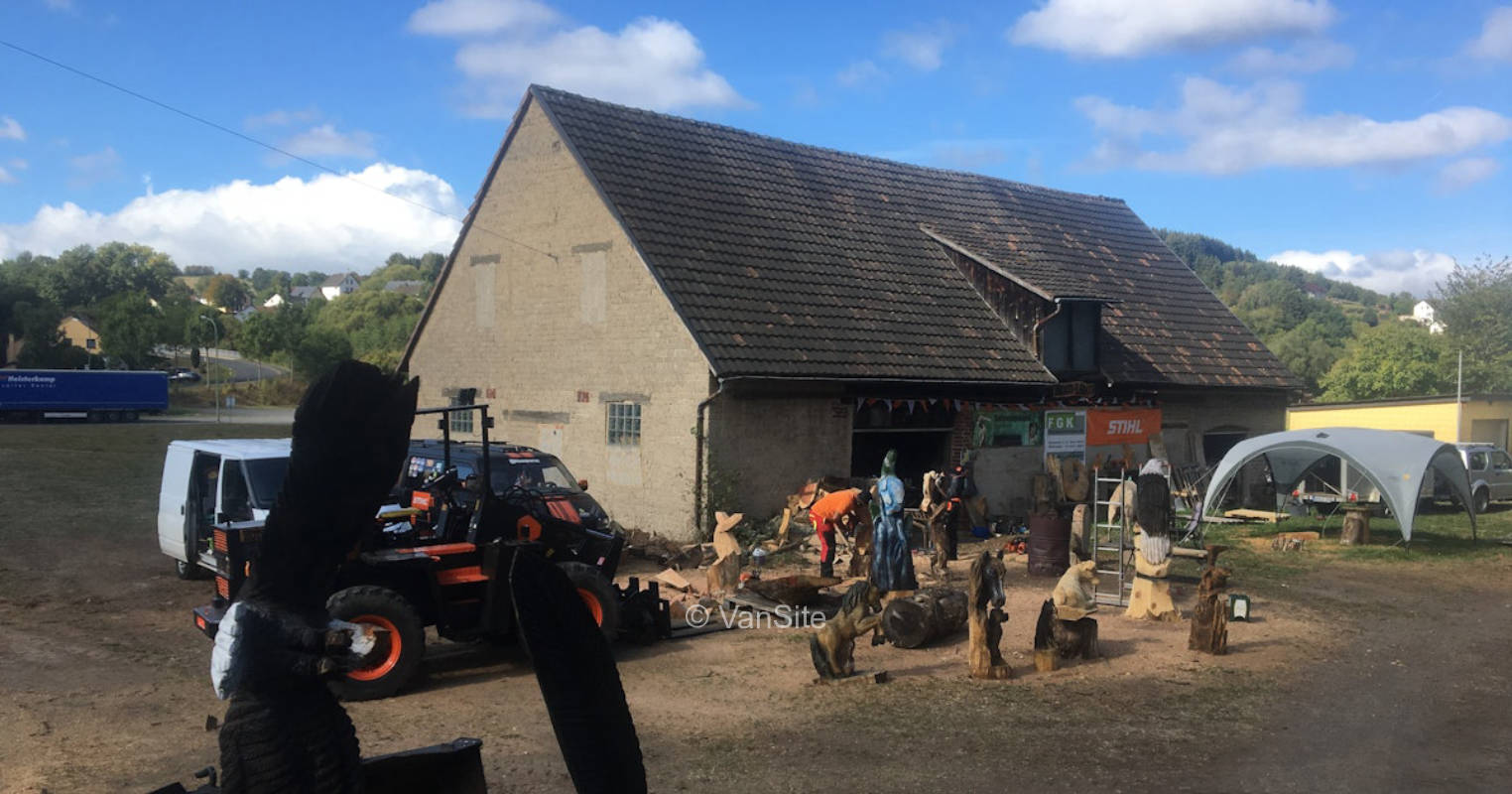 At the chainsaw carver