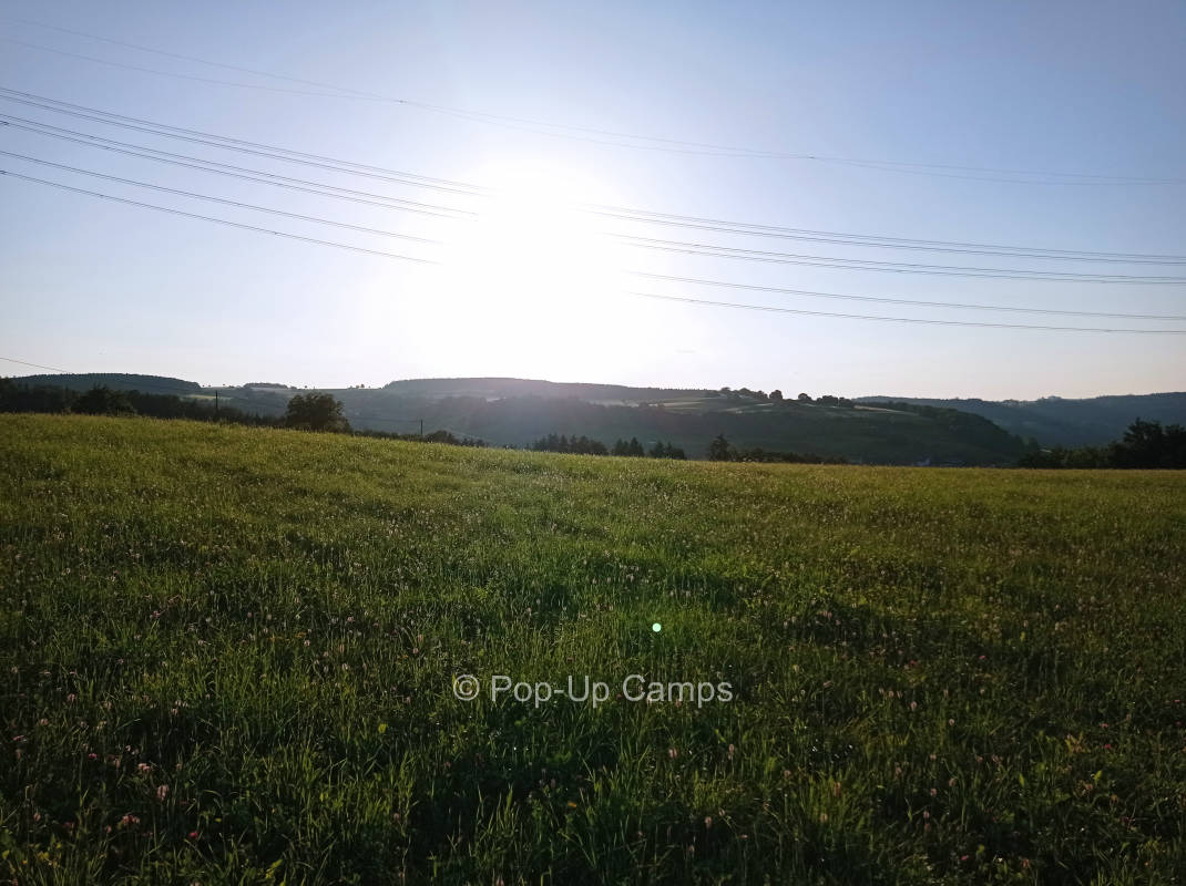 Natural pitch with distant view at the edge of the meadow