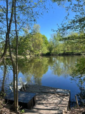 Woodland property with jetty and fishing pond