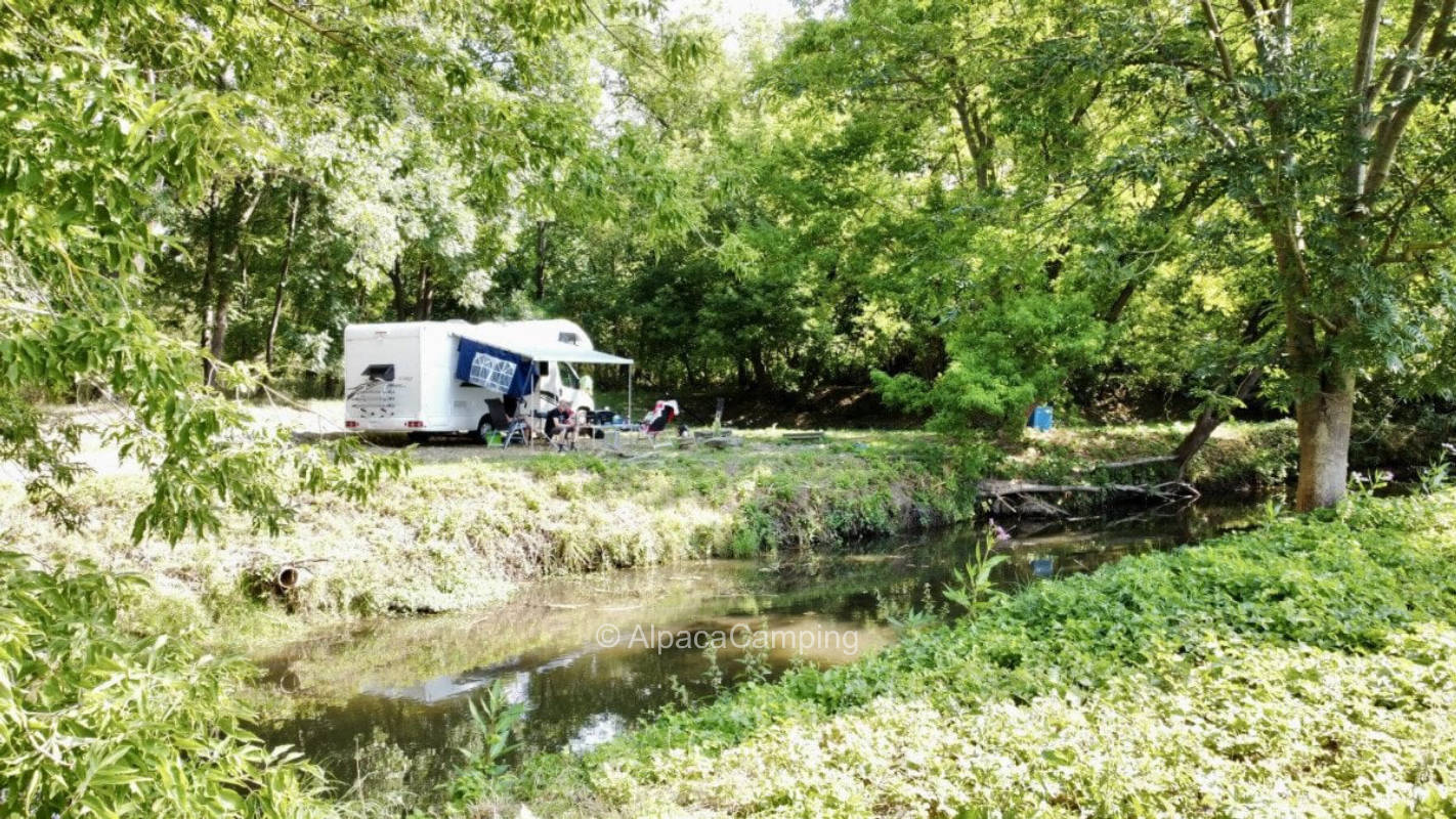 Relaxing by the Wipper - campfire site