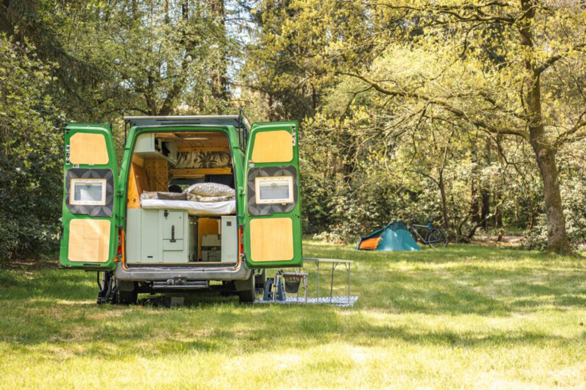 Forest camping with private pond near the North Sea coast