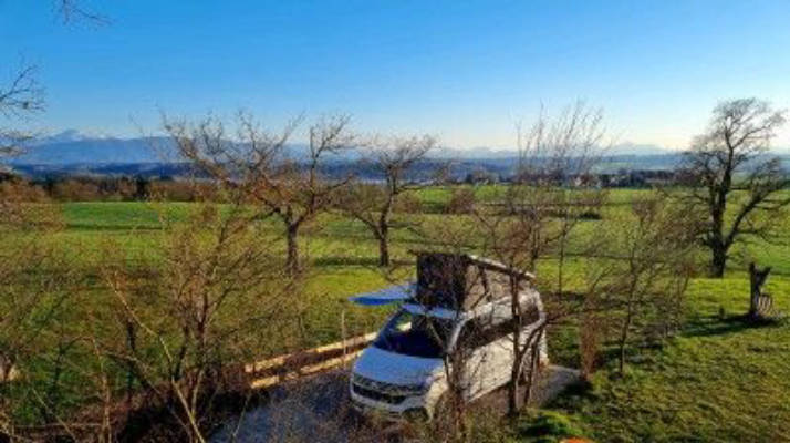 Single pitch with lake and mountain views