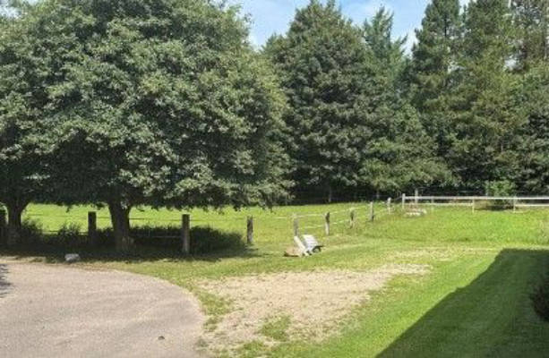 Farmstead surrounded by nature with many animals near Denmark