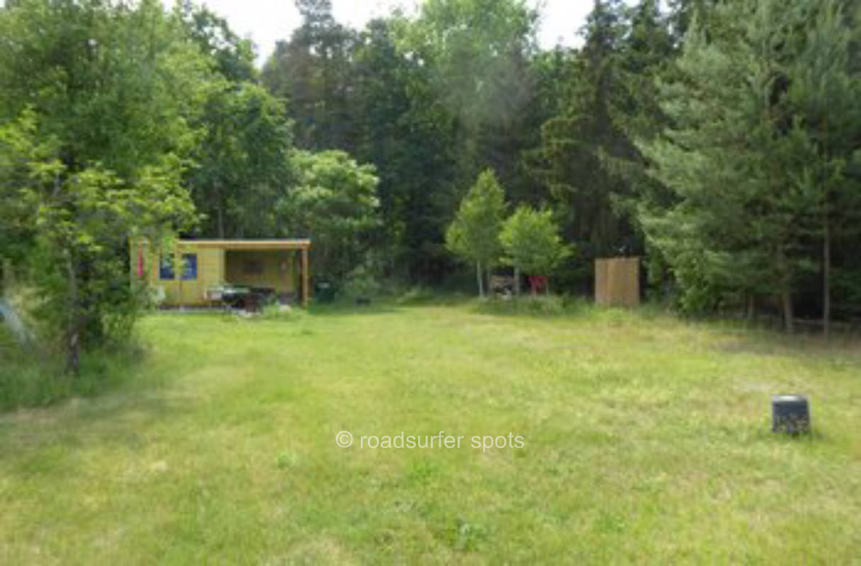 Garden house and pitch by the forest