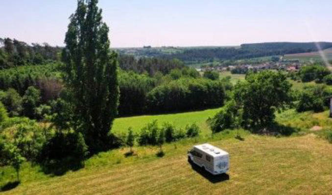 South-facing location at the edge of a farmstead