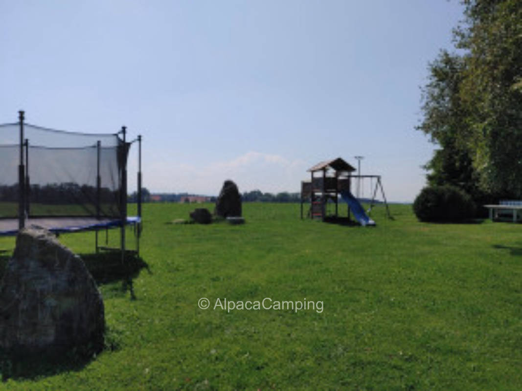 Pitch at the farm with view to the mountains #1